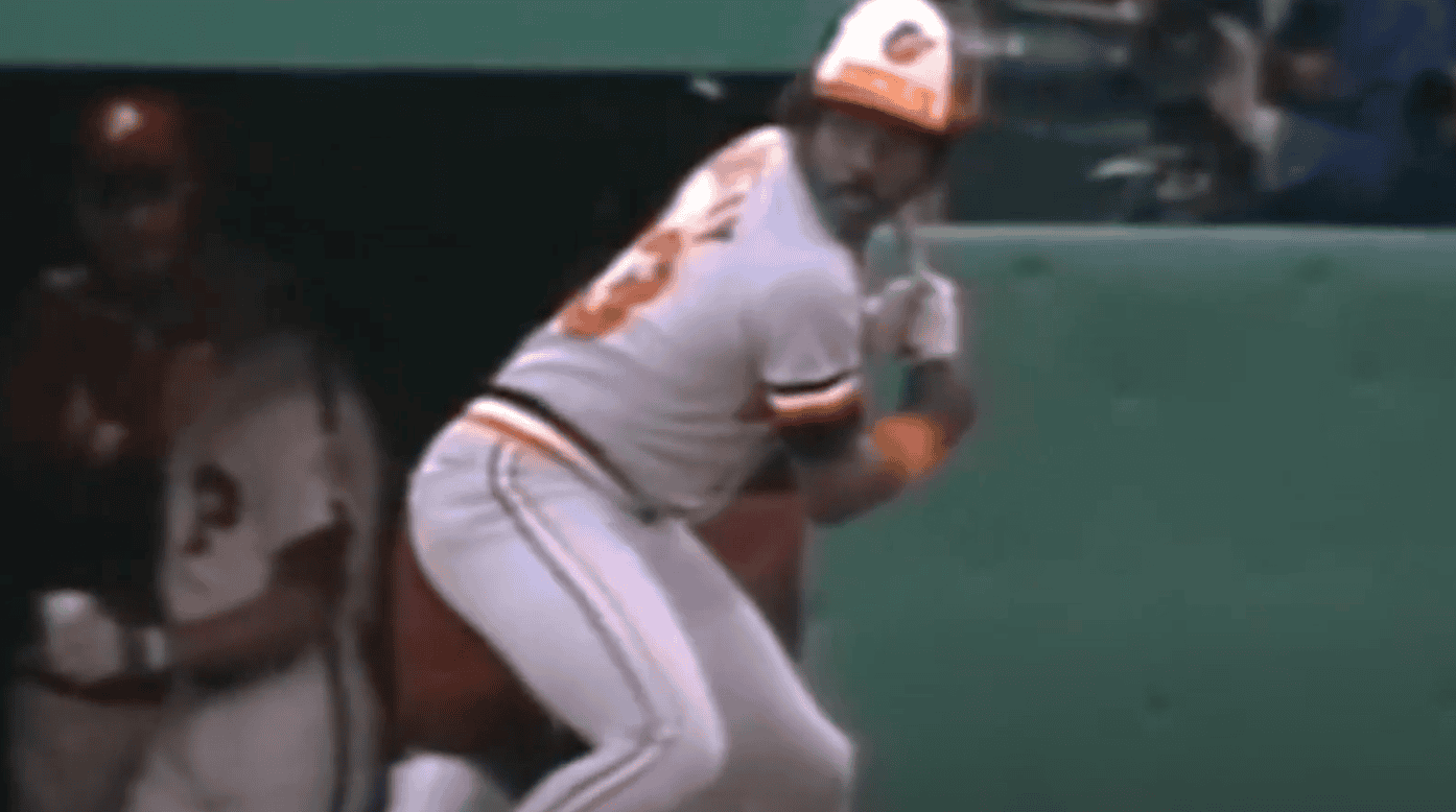 Eddie Murray, a key player of the 1980s, hitting a baseball during a game.